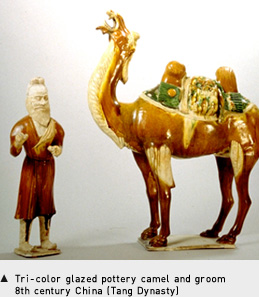 Tri-color glazed pottery camel and groom 8th century China (Tang Dynasty)